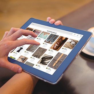 person doing online shopping on their tablet