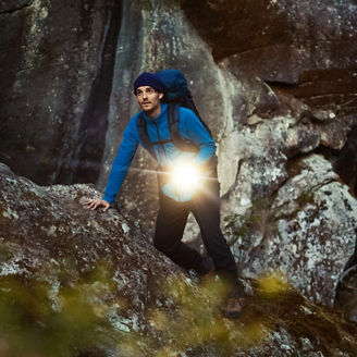 Person hiking mountains