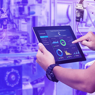 person in robotic lab with tablet banner