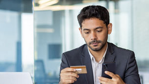 person looking at the card