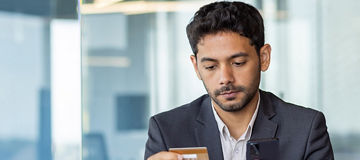 person looking at the card