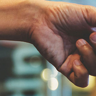 Girl smiling in a group meeting