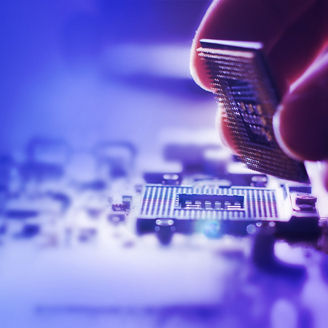 Person putting a chip in a system