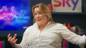 A person in a studio setting speaking with Sky logo visible in the background.