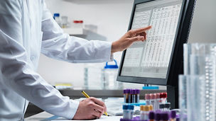 person-working-on-computer-in-laboratory