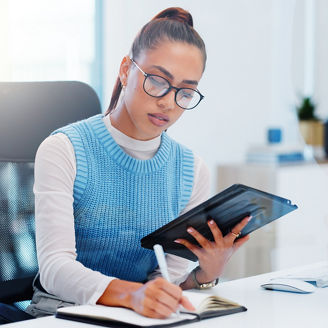 Tablet, writing and woman with plan in office, research or virtual assistant with schedule or meeting. Glasses, notebook and secretary with concentration, online or employee with journal or corporate.