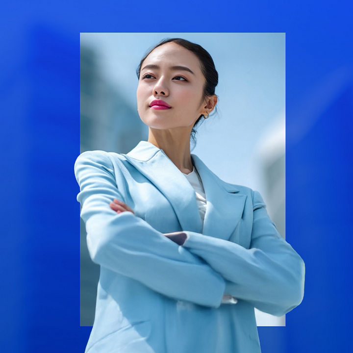 Professional business woman smiling in suit