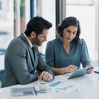 Business people, teamwork and tablet for statistics, finance report and planning of revenue, profit or sales in office. Professional advisor or clients with data analytics, graphs and digital charts