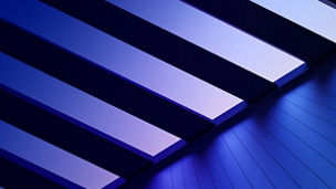 Purple-blue sky viewed upwards through slatted ceiling