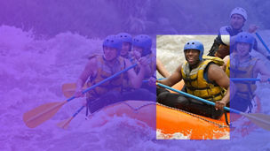 man rafting and smiling