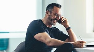 Person talking with a smartphone