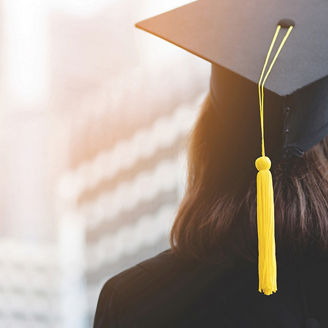 Rear view of a college graduate girl