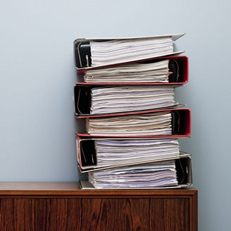 Ring binders on cabinet. Keywords: Document, Ring Binder, Paper, Stack, Organisation, Paperwork, Order, Cupboard, No People, Photography, Colour Image, Abundance, Germany, Day, Copy Space, Horizontal, Indoors, Still Life 