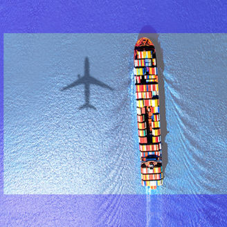 Ship in sea and shadow of plane