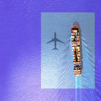Ship in sea and shadow of plane