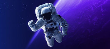 Shot of astronaut in outer space banner