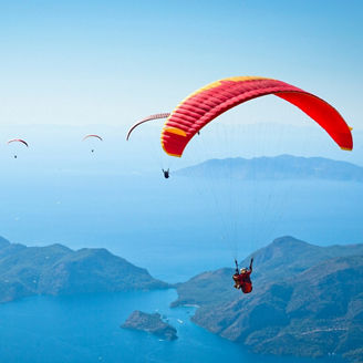 Shot of red paragliders