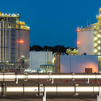 pipelines in the LNG terminal at night,3d illustration