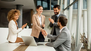 Group of multiethnic young business people working together in the office