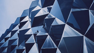 Abstract geometric background with triangles and buildings cells