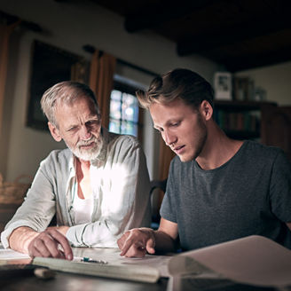 Architect, father and man planning blueprint together for collaboration, studying and research in home. Senior person, student and documents in house for drawing, education and design paperwork; Shutterstock ID 2469536079; purchase_order: 