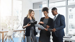 Attorney, teamwork and documents with business people in office for legislation, privacy policy and lawyer. Case proposal, planning and legal counsel with employees in law firm for justice together