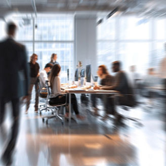 Blurred modern office interior with people working at desks; Shutterstock ID 2730976943; purchase_order: 