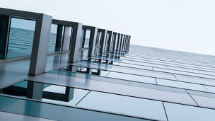 Urban Geometry, looking up to glass building. Modern architecture, glass and steel. . Abstract architectural design. Inspirational, artistic image.Minimal art. 