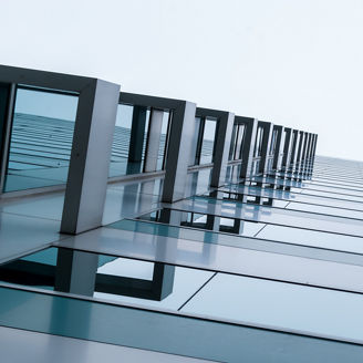 Urban Geometry, looking up to glass building. Modern architecture, glass and steel. . Abstract architectural design. Inspirational, artistic image.Minimal art. 