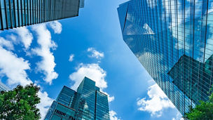 sky clouds glass building view from bottom