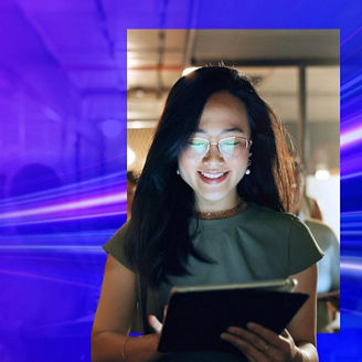 Woman smiling at tablet