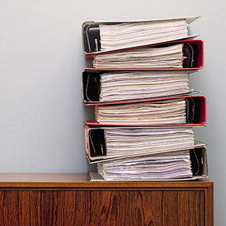 Ring binders on cabinet