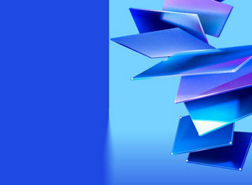 Stacked translucent glass panels are arranged on a blue background.