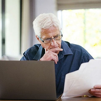 A man is looking at documents