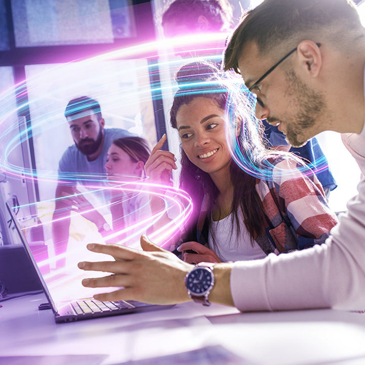 Students using laptop with light beams coming out of it repsenting generative AI banner