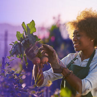 Woman with beetroot in her hands