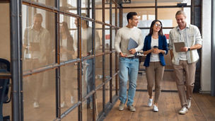 Multiracial young creative people in modern office. Group of young business people hipster team are working together in coworking . Freelancers