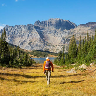 a person hiking in a beautiful scenary