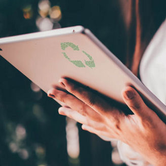 Young businessmen analyze Environmental protection business to meet goals set over blurred Nature background .Film tones and Light fair. select focus