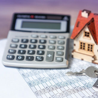 Taschenrechner und Haus