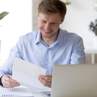 Tax consultant looking at invoice