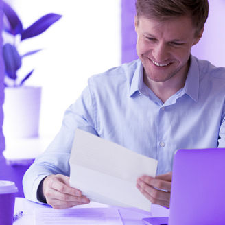 Tax consultant looking at invoice