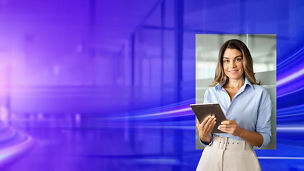 A woman holding a tablet