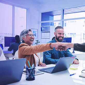 Team Mates Cheering Up at Workplace banner