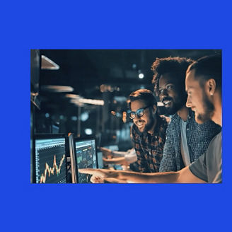 people working looking at papers