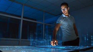 Emergency exit sign on the ceiling of a room