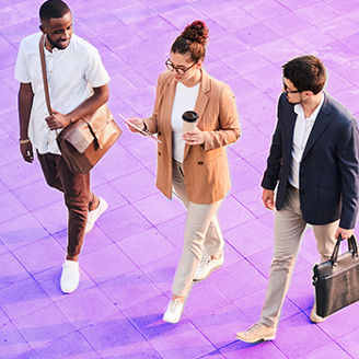 three business people walking