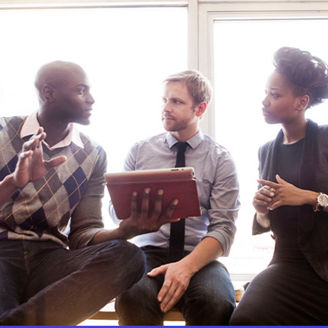 Three people discussing