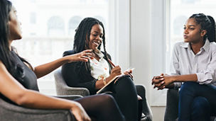 Three women discussing