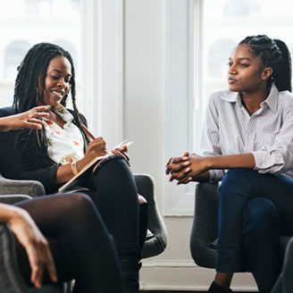 Three women discussing